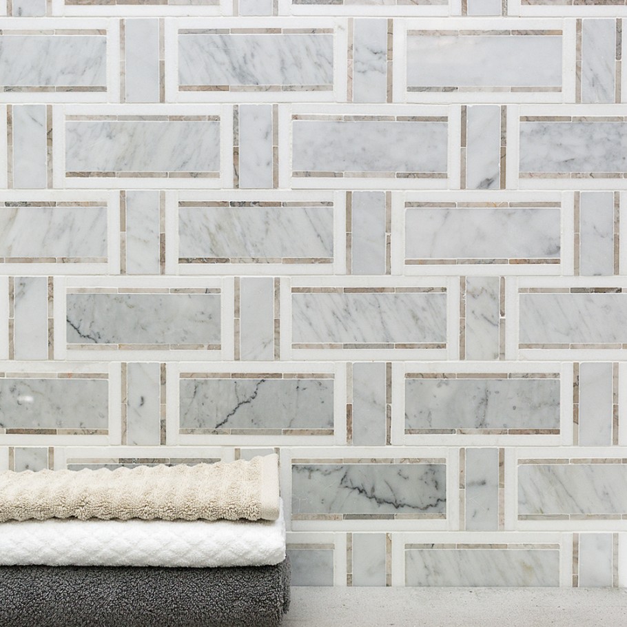 Beautiful marble tile in a basket weave pattern on bathroom wall 