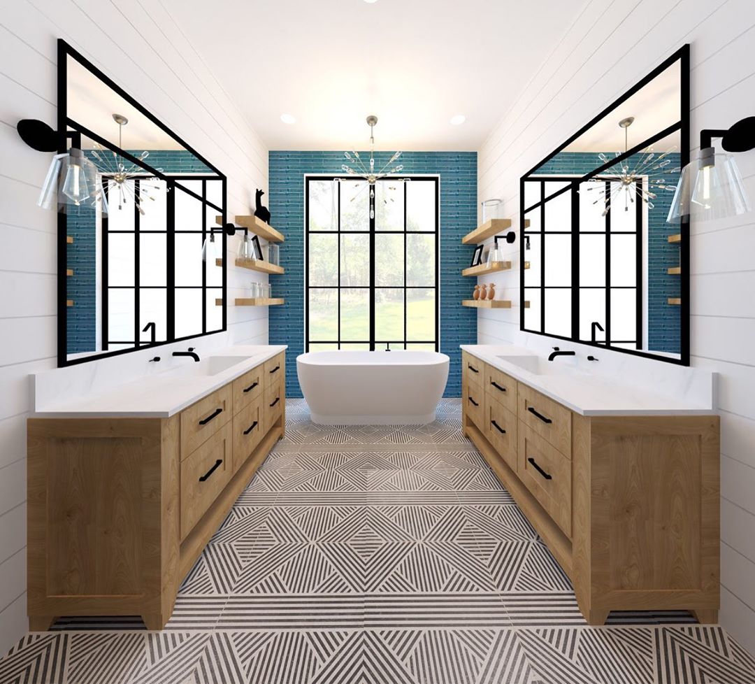 Large Bathroom With His and Hers Sinks and Black and White Patterned Tile Floor