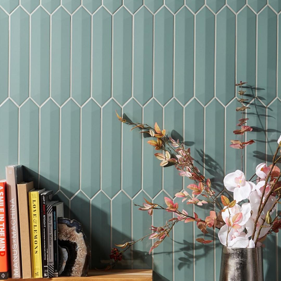 Kent Contour 3D Picket Jade 2.6x13 Polished Ceramic Wall Tile, Hexagon shown on the wall with flowers and books to help bring the colour from the tile