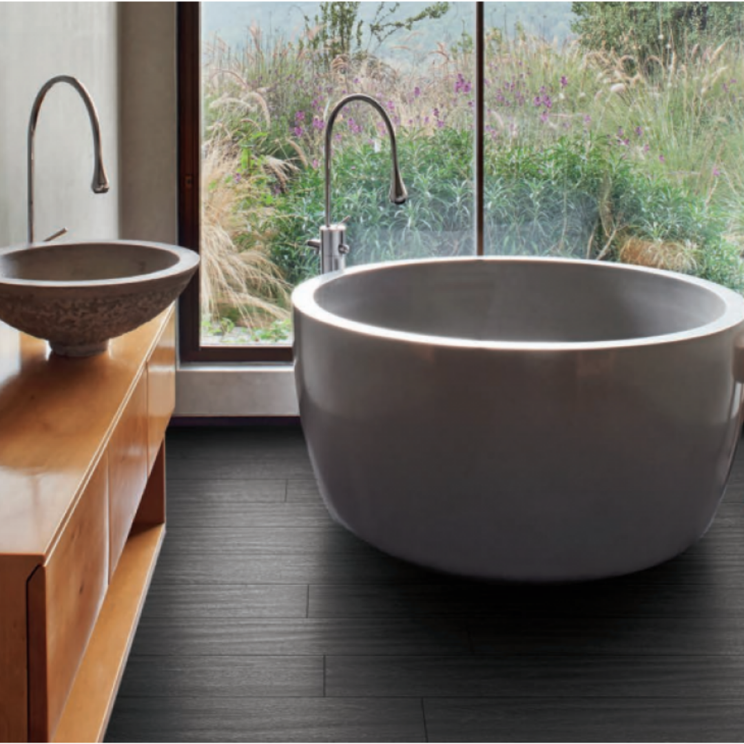 industry wood barbican nero 8x48 matte porcelain tile used in bathroom next to modern roll top bath