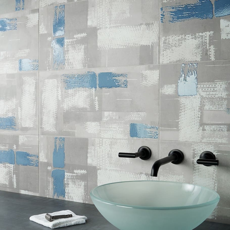 Stuyvesant Decoro Denim 12x24 Glazed Porcelain Tile shown in bathroom as backsplash / wall tile