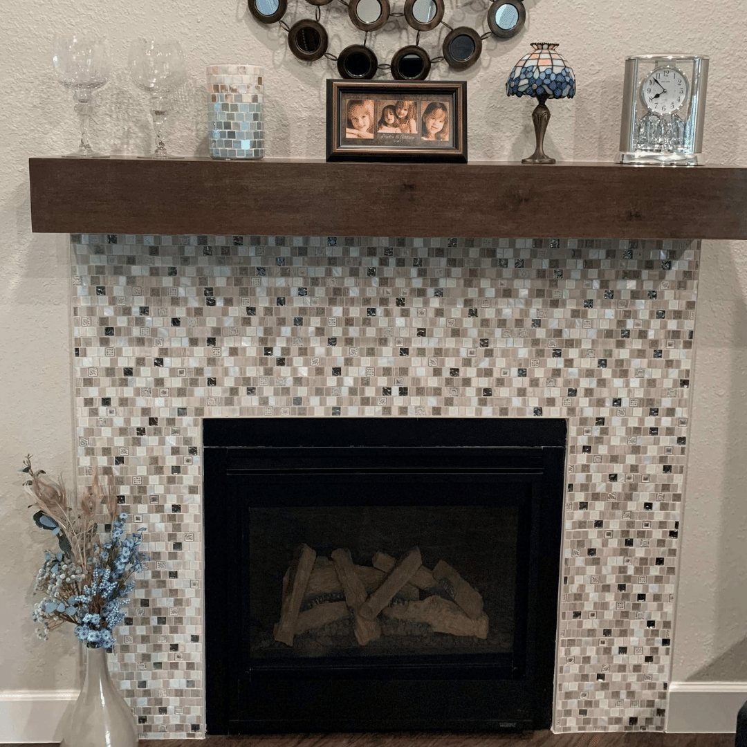 Lotus Ivory Tusk Marble & Glass Polished Mosaic Tile used around a fireplace in Livingroom 